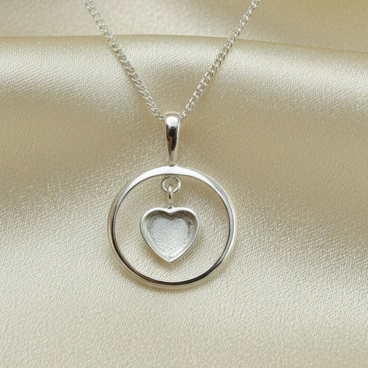 Solid Silver Pendant With Heart