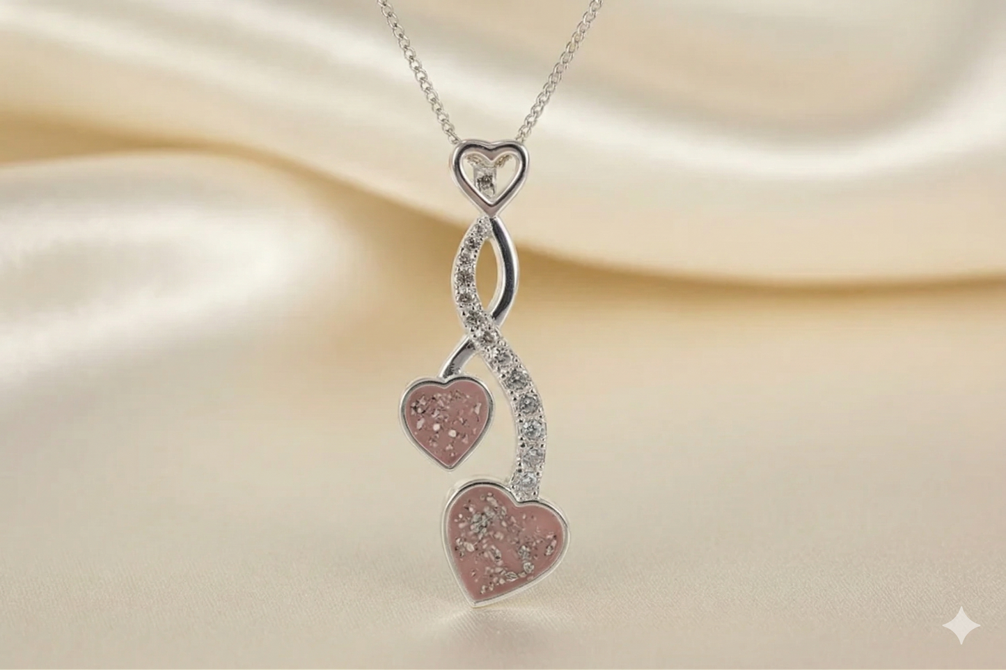 Sterling Silver CZ entwined hearts Pendant