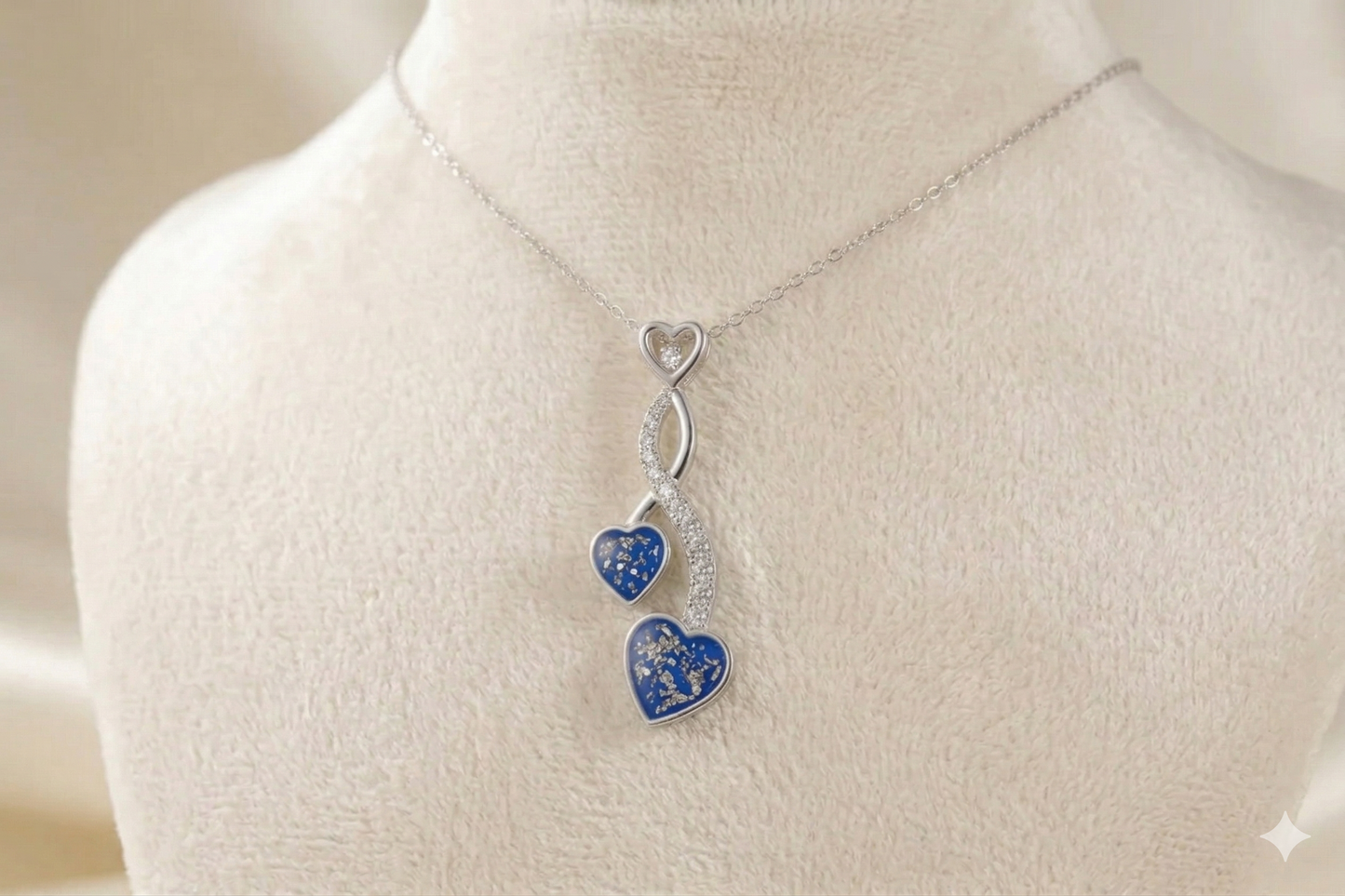 Sterling Silver CZ entwined hearts Pendant