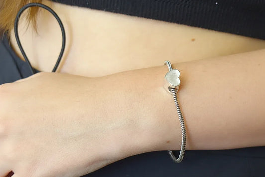 Silver heart charm