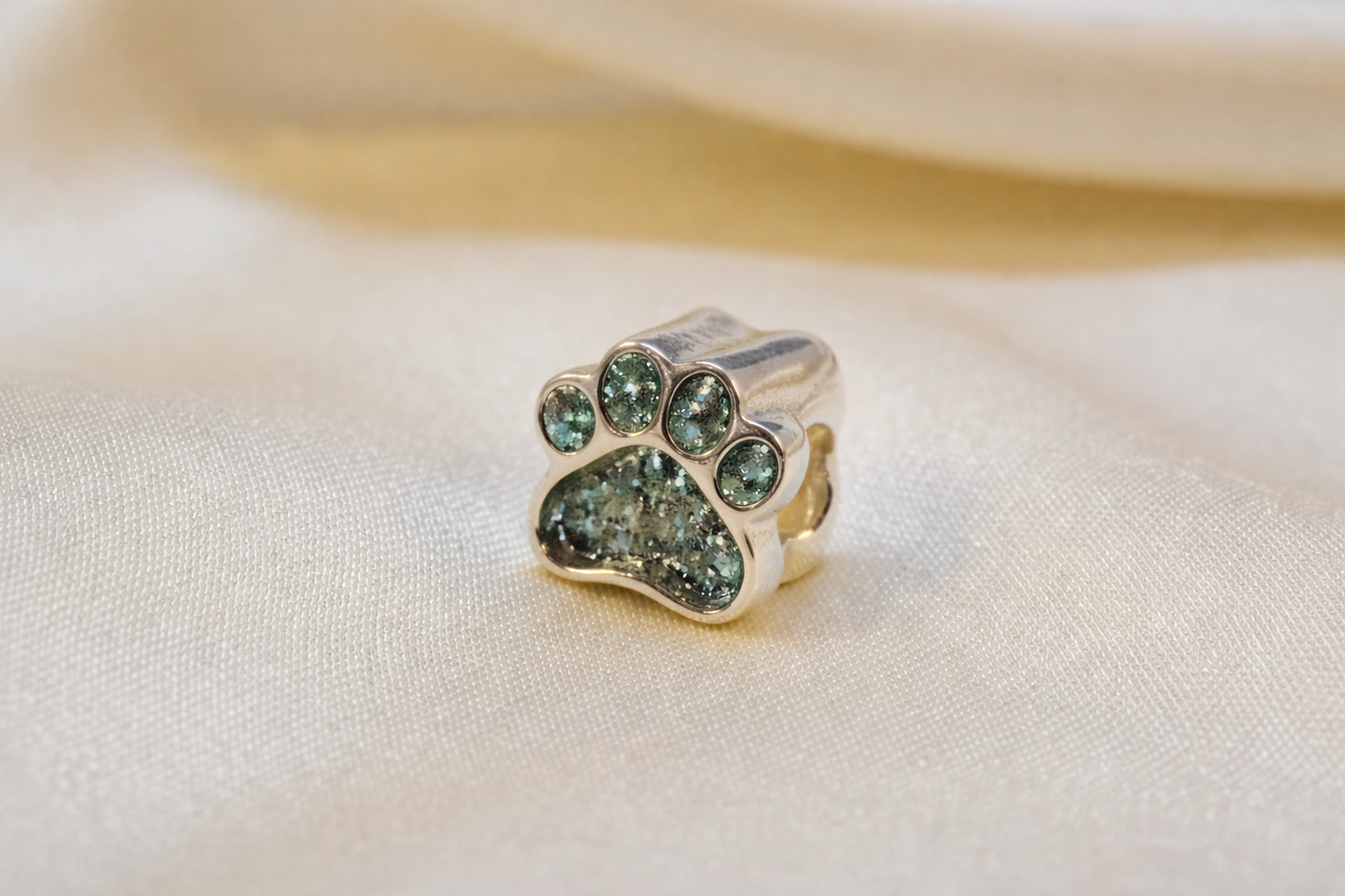 Silver paw charm