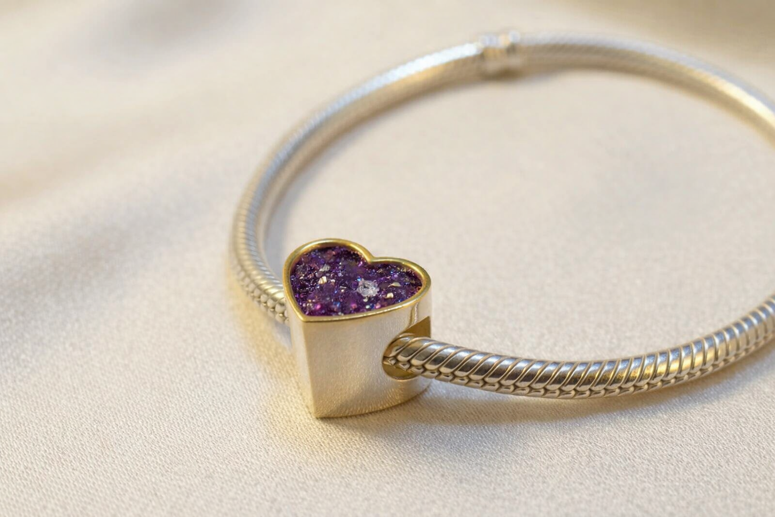 Silver heart charm