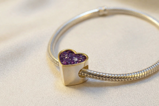 Silver heart charm